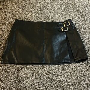 Black leather mink skirt with buckle and slit